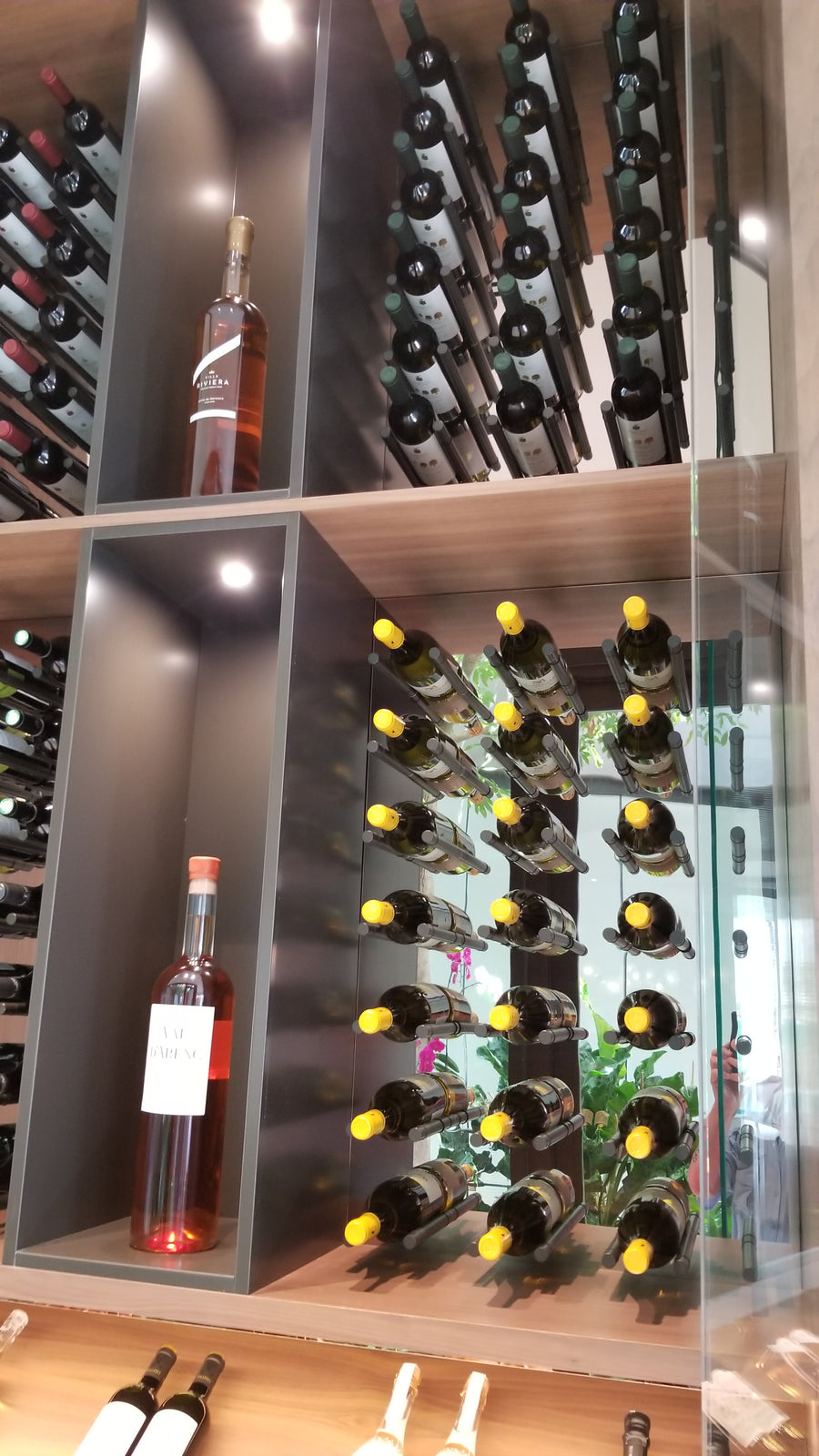 Wine storage with aluminum wine pegs.