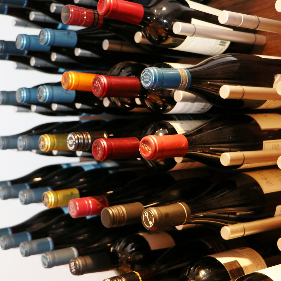 Wine display with aluminum pegs 
